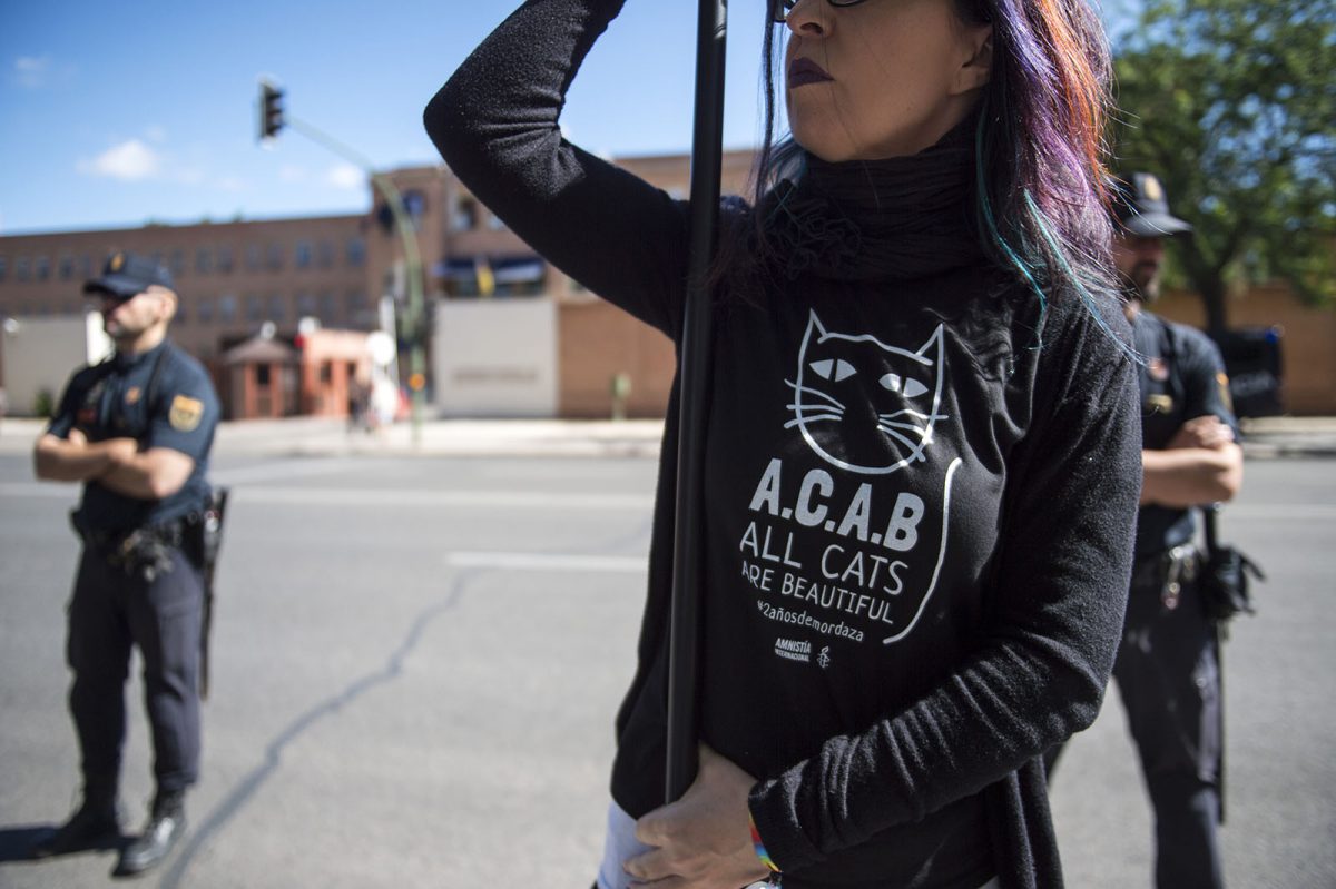 Acto convocado por Amnistía Internacional y No Somos Delito para exigir la reforma de la Ley de Seguridad Ciudadana frente a la Comisaría General de Seguridad Ciudadana en Madrid. Foto: Álvaro Minguito.